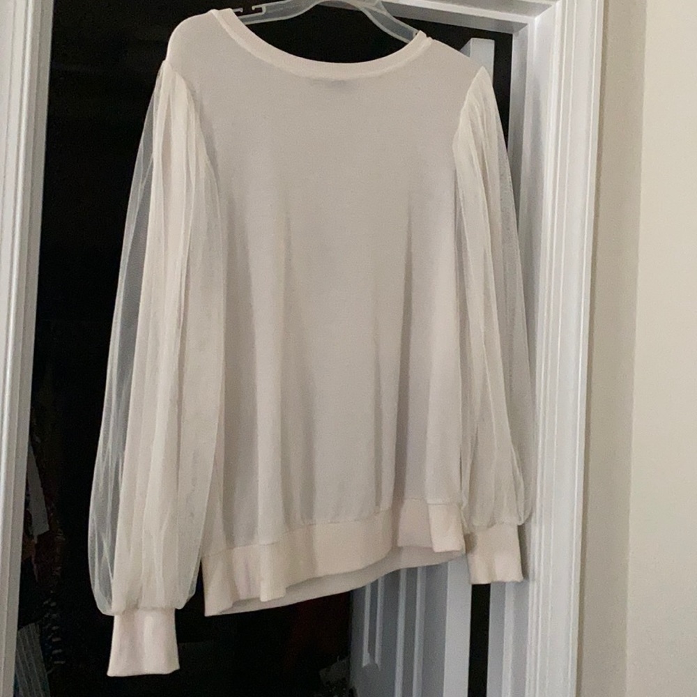 Off white long sleeved shirt